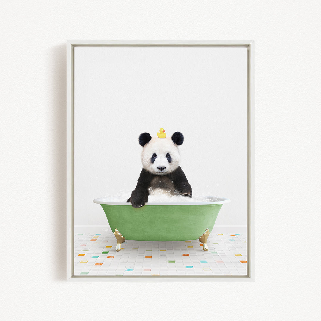 A panda bear sitting in a green bathtub, with a yellow rubber duck floating on its head.