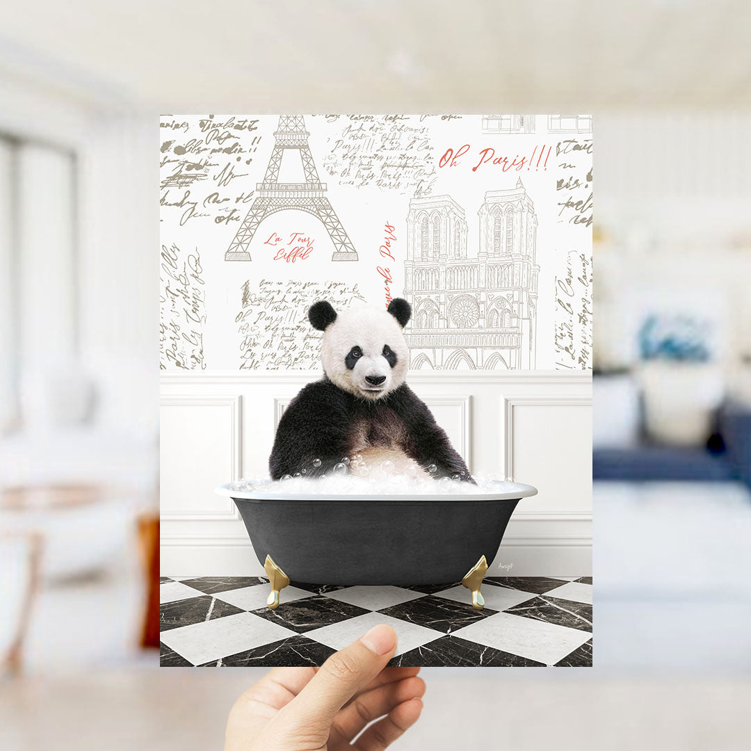 A panda bear sitting in a bathtub filled with bubbles, surrounded by various Paris-themed illustrations and text.