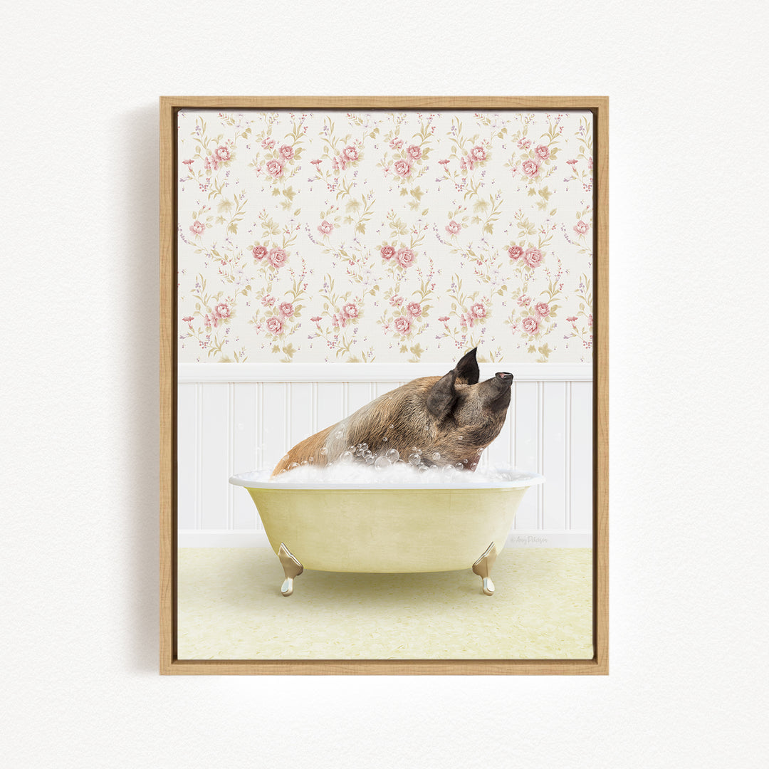 A brown pig sitting in a yellow bathtub filled with bubbles, with a floral wallpaper in the background.