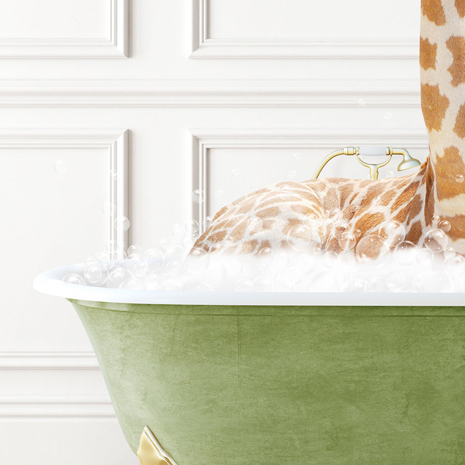 a giraffe laying down in a bath tub