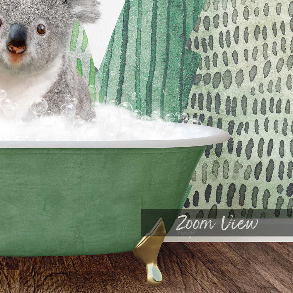 A koala sitting in a green bathtub filled with bubbles, with a patterned wall in the background.