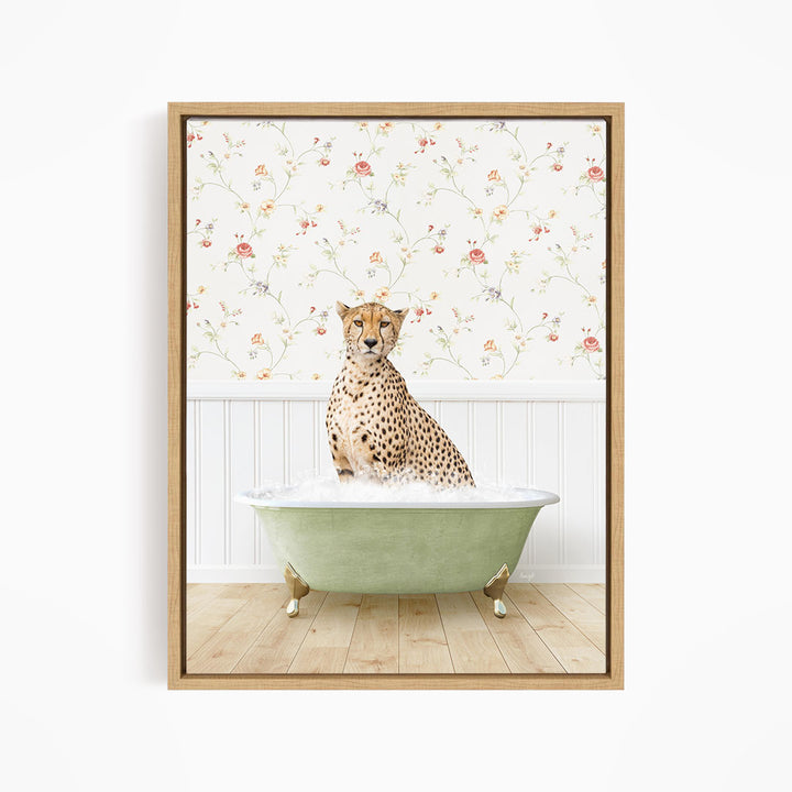 A cheetah sitting in a green bathtub filled with water, with a floral wallpaper in the background.