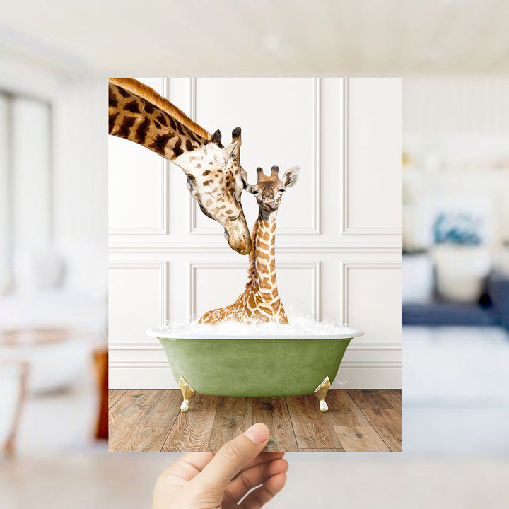 A mother giraffe and her baby giraffe are sitting together in a green bathtub filled with water, creating a heartwarming scene.