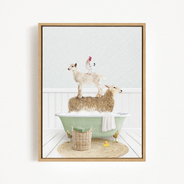A framed image depicting a sheep standing on a tub filled with bubbles, with a chicken perched on top, and a yellow rubber duck floating in the water.