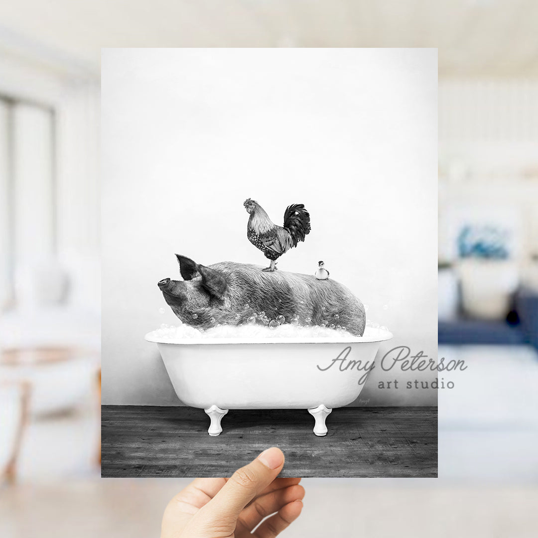 a black and white photo of a pig in a bathtub