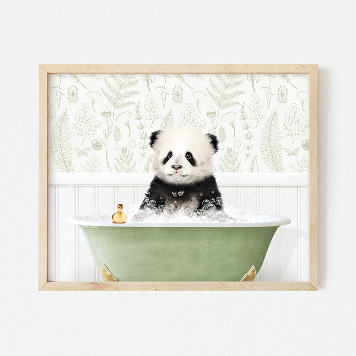 a panda bear sitting in a bath tub