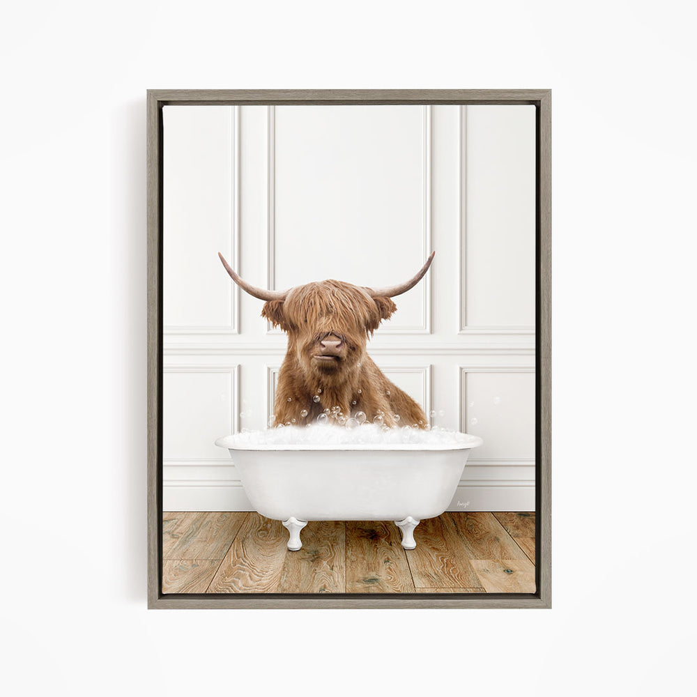 A brown cow with long horns is sitting in a white bathtub filled with water, creating a whimsical and playful scene.