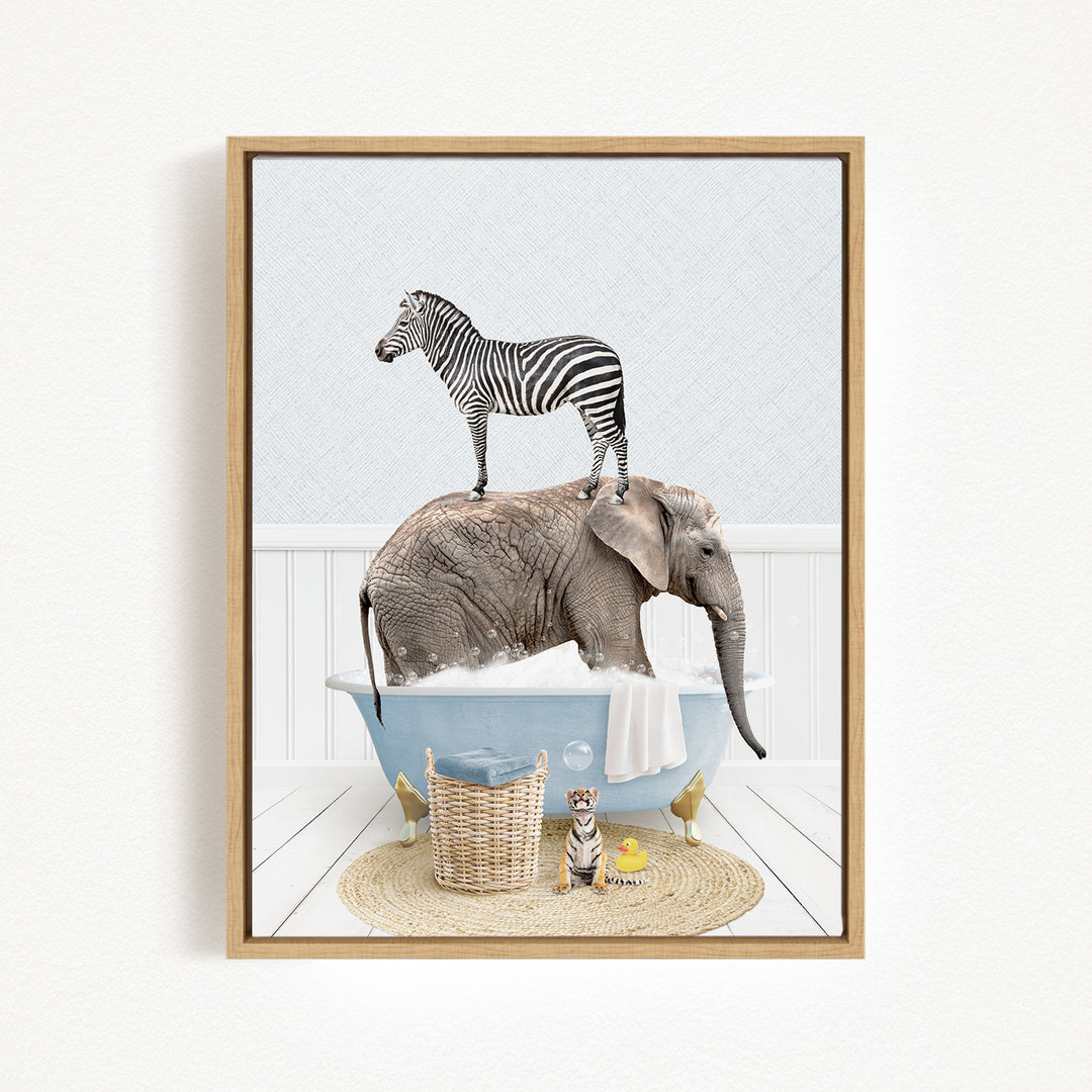 A zebra stands on the back of an elephant, which is submerged in a bathtub filled with bubbles, while a cat and a dog sit nearby on a woven mat.