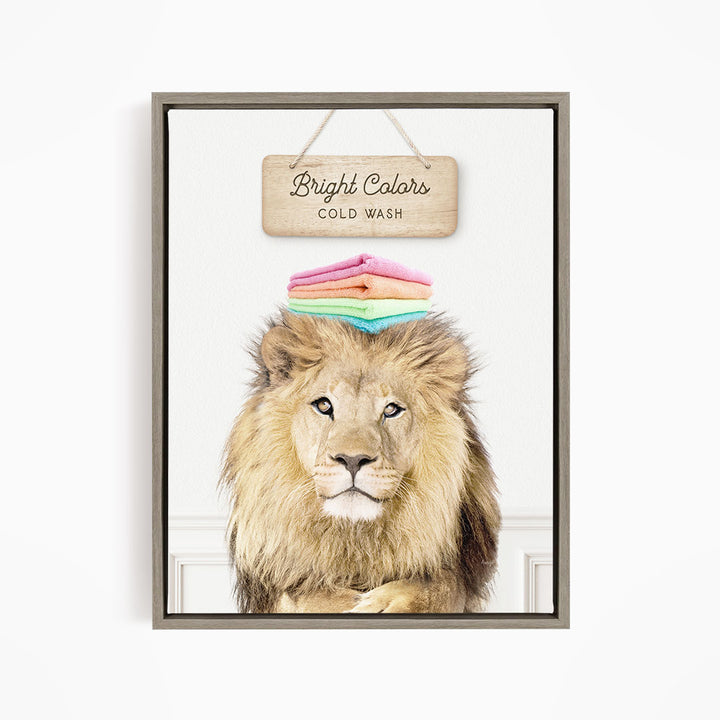 A framed image of a lion with a sign above it that says "Bright Colors Cold Wash".
