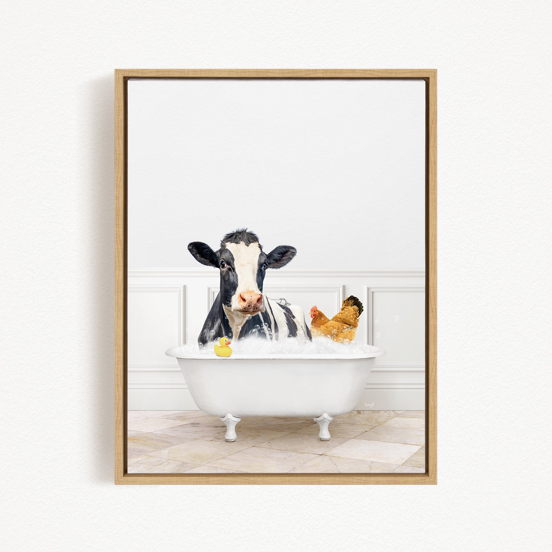 A black and white cow is sitting in a white bathtub, surrounded by a yellow rubber duck and a chicken, creating a whimsical and playful scene.