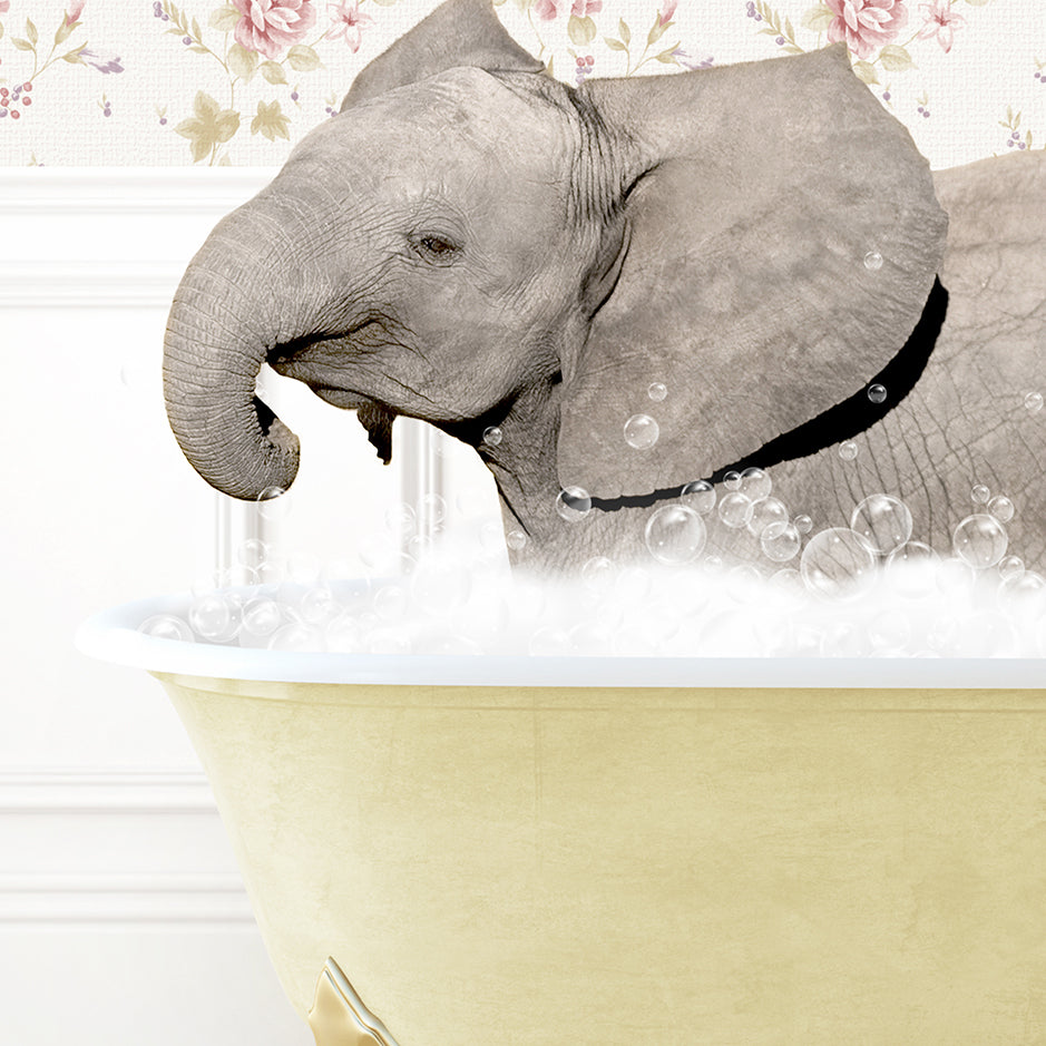 a baby elephant taking a bath in a bathtub