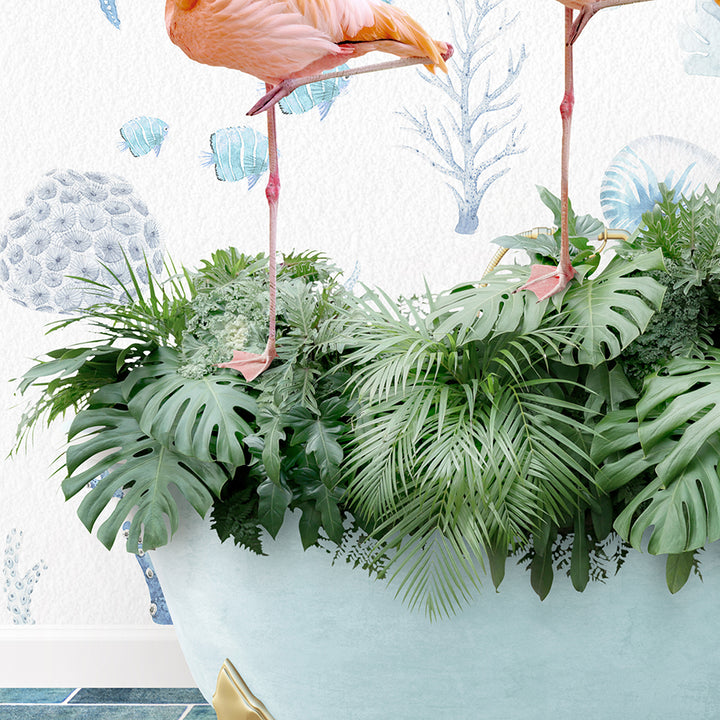 two flamingos are standing on top of a planter