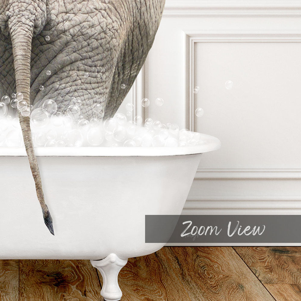 An elephant is standing in a bathtub filled with bubbles, creating a whimsical and playful scene.