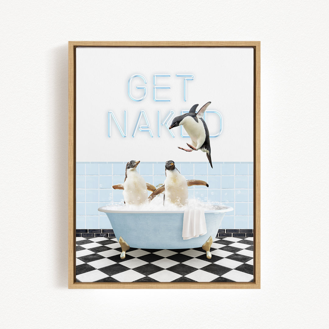 A framed image depicting three penguins sitting in a bathtub, with one penguin jumping out of the tub and the other two penguins sitting in the water. The text "GET NAKED" is displayed above the penguins.