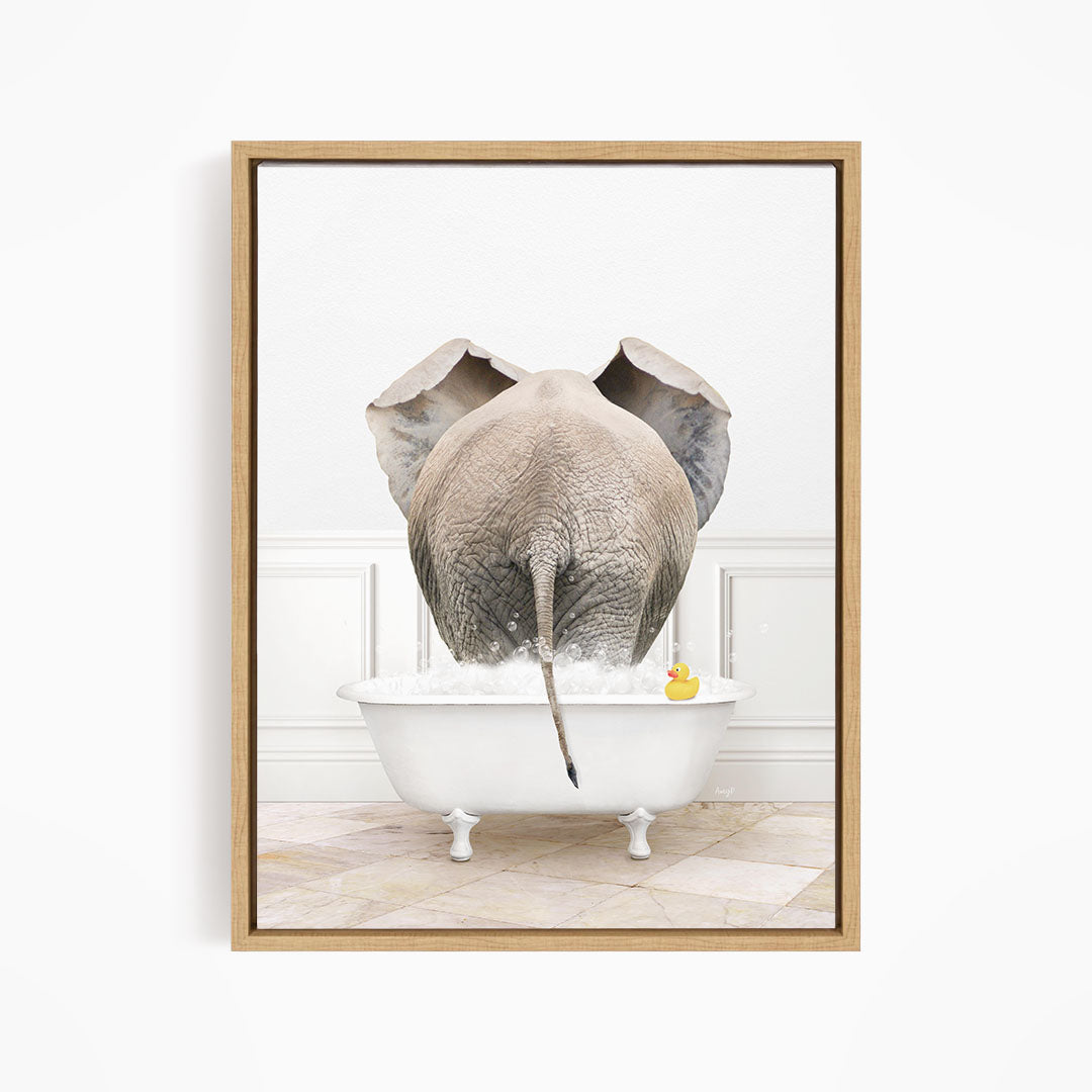 An elephant is standing in a white bathtub filled with water, with a rubber duck floating nearby.
