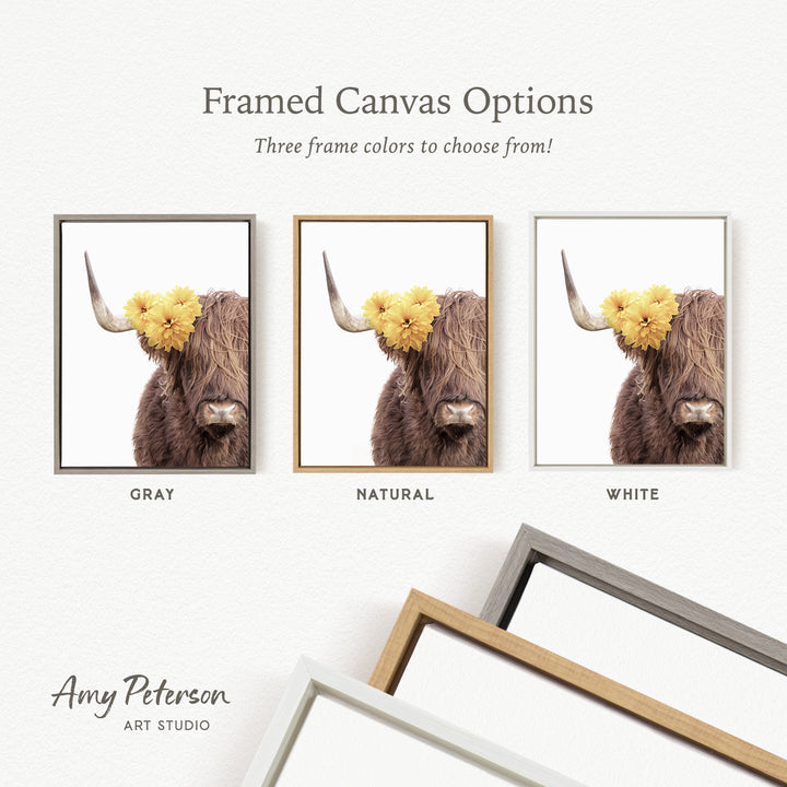 three framed canvas options for a picture of a cow with flowers on its horns. The options include a gray frame, a natural frame, and a white frame.