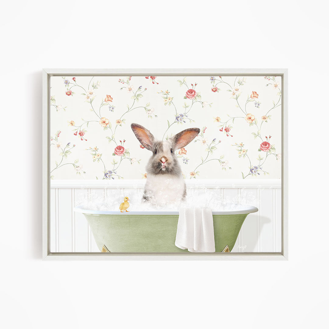 A white rabbit sitting in a green bathtub, surrounded by a floral wallpaper.