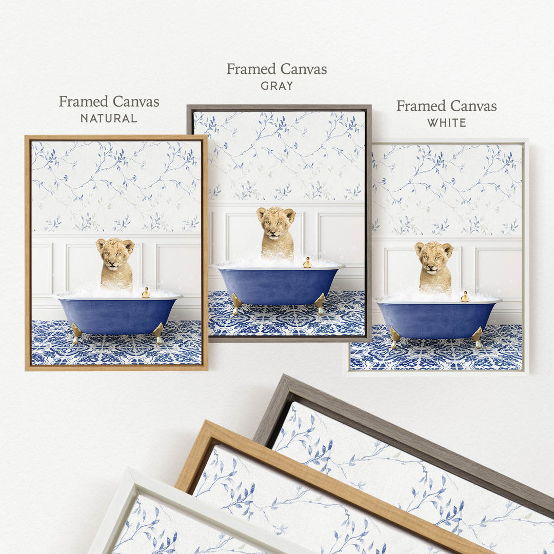 The image is a framed canvas depicting a lion cub sitting in a blue bathtub, surrounded by a floral pattern.