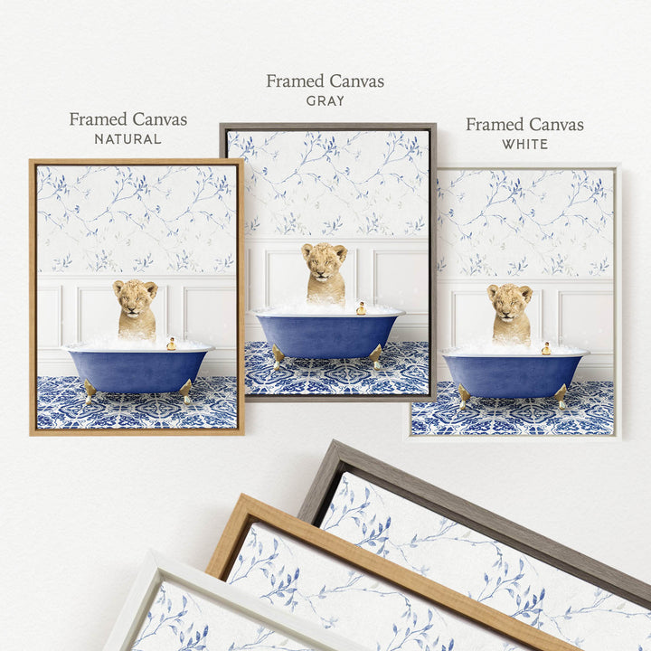 The image is a framed canvas depicting a lion cub sitting in a blue bathtub, surrounded by a floral pattern.