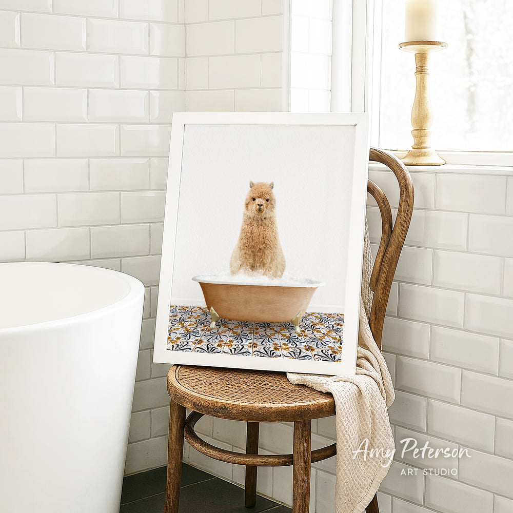 A framed image of a small dog sitting in a bathtub filled with water, surrounded by a patterned tile design.