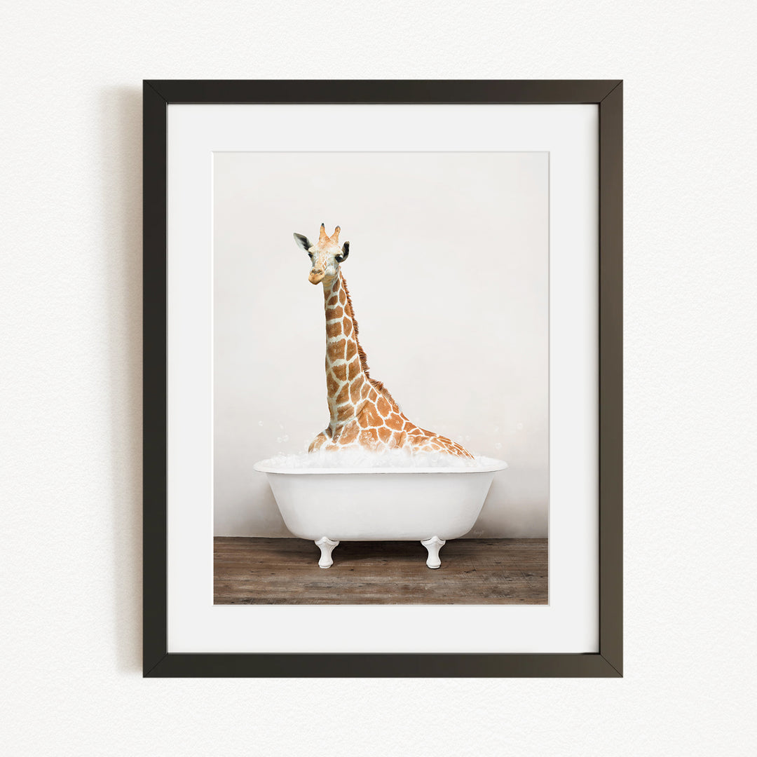 A giraffe sitting in a white bathtub, with its head and neck raised above the water.