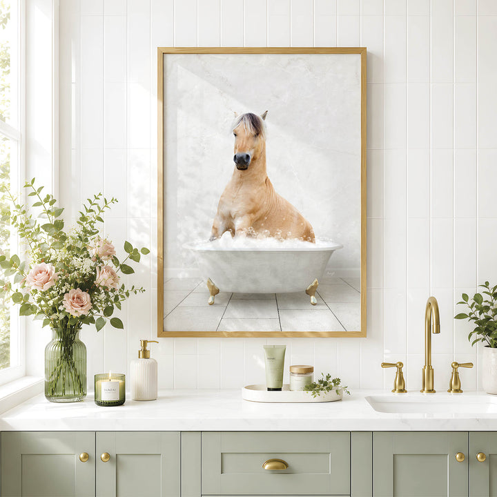 a bathroom with a framed picture of a horse sitting in a bathtub, surrounded by flowers and candles.