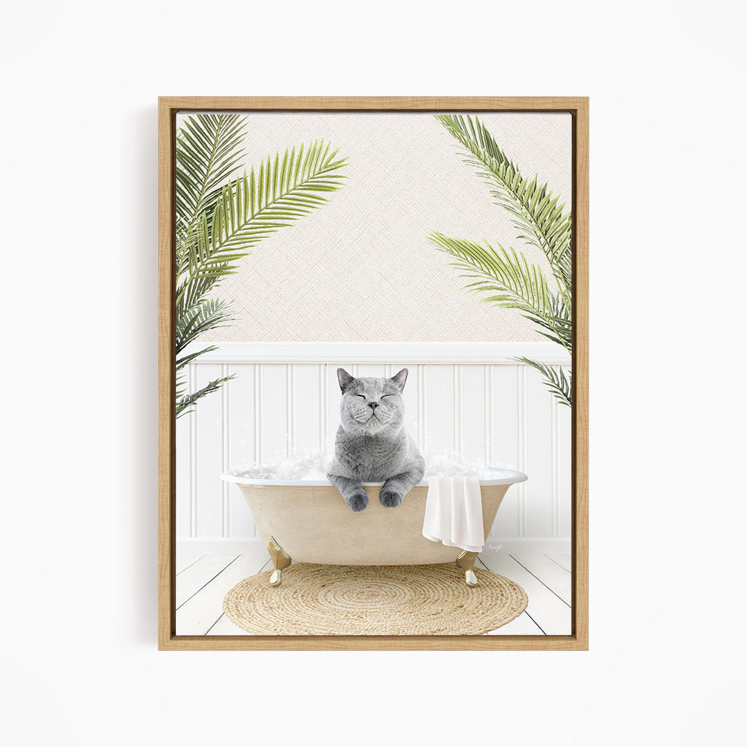A gray cat sitting in a bathtub filled with bubbles, surrounded by green palm leaves, creating a whimsical and relaxing scene.