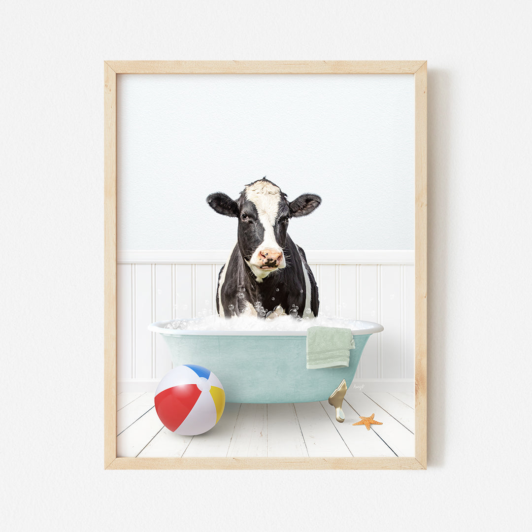 a picture of a cow in a bathtub with a beach ball