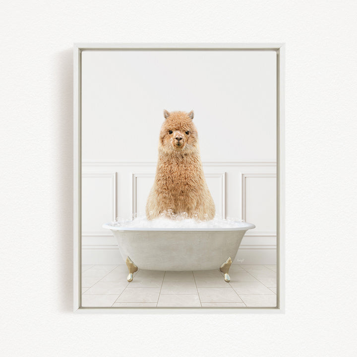 A fluffy brown alpaca sitting in a white bathtub filled with bubbles, creating a whimsical and adorable scene.