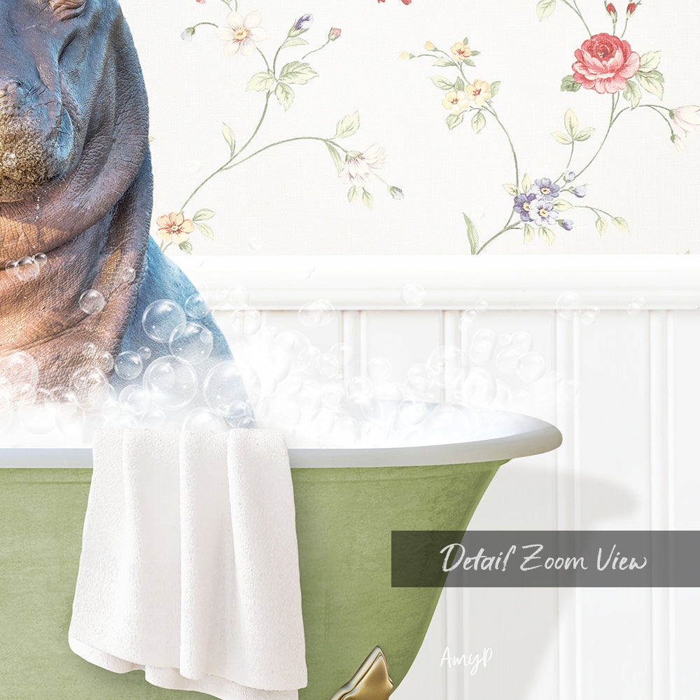 A close-up of a bathtub filled with bubbles, with a towel draped over the side and a floral wallpaper in the background.