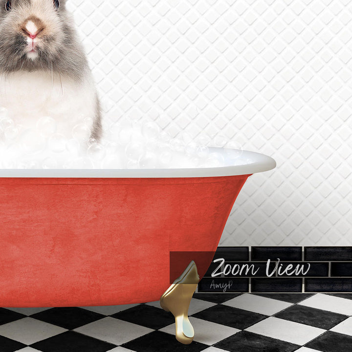 A small white rabbit sitting in a red bathtub filled with bubbles, with a black and white checkered floor and a tile wall in the background.