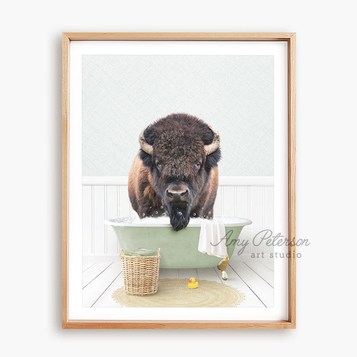 a picture of a bison taking a bath