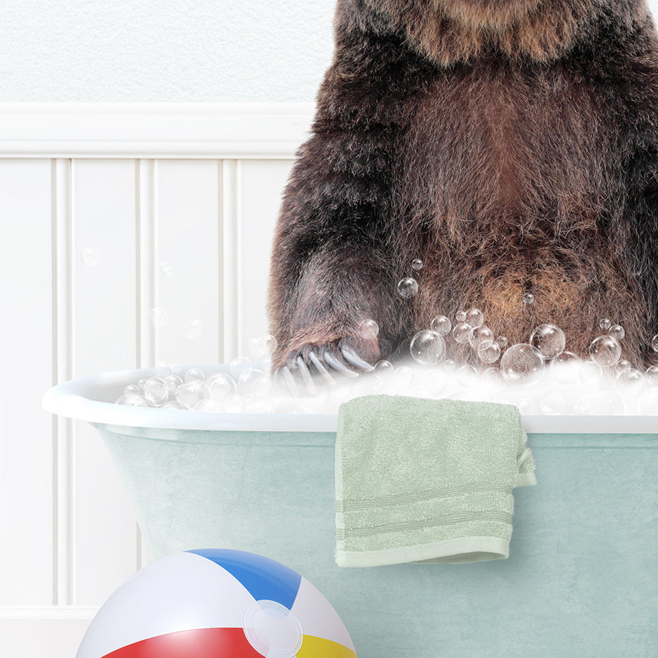 a large brown bear sitting in a bath tub