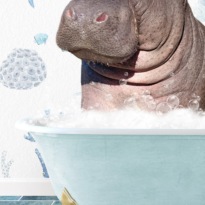 a hippopotamus sitting in a bathtub full of bubbles