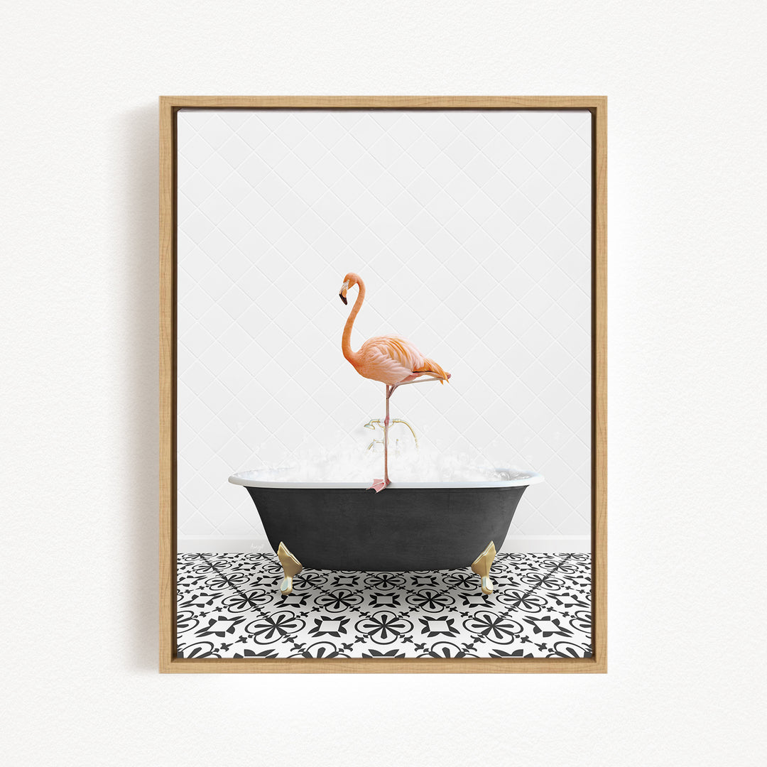 A flamingo standing on a black bathtub filled with water, set against a white background with a black and white patterned floor.