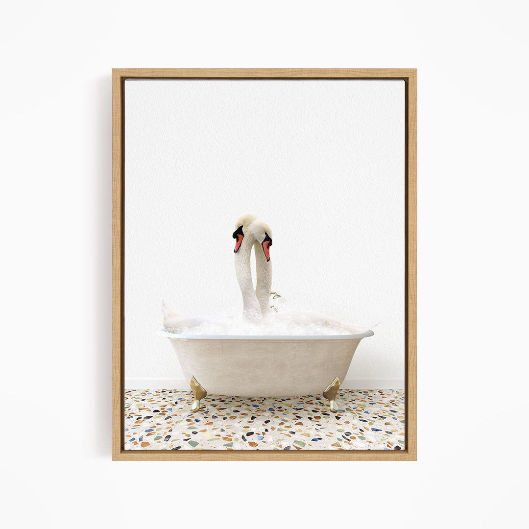 A pair of swans standing in a white bathtub filled with water, creating a serene and peaceful scene.