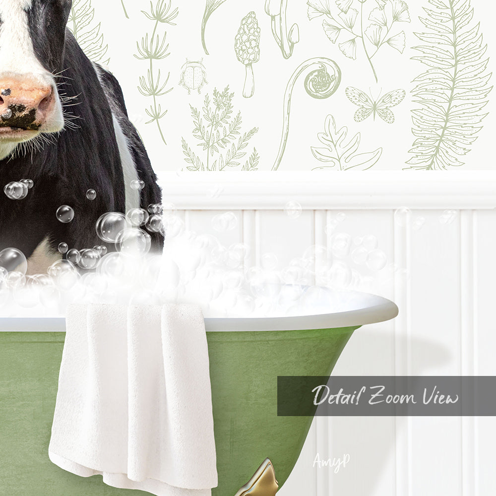 A cow is sitting in a green bathtub filled with bubbles, surrounded by a floral pattern on the wall behind it.