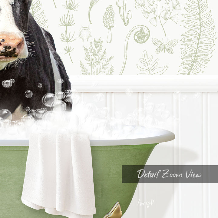A cow is sitting in a green bathtub filled with bubbles, surrounded by a floral pattern on the wall behind it.