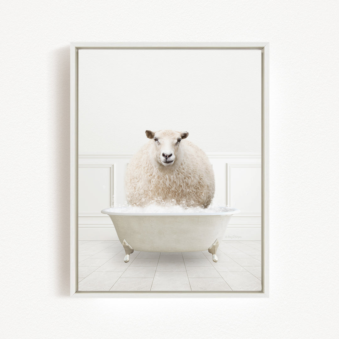 A fluffy white sheep sits in a white bathtub filled with bubbles, creating a whimsical and amusing scene.