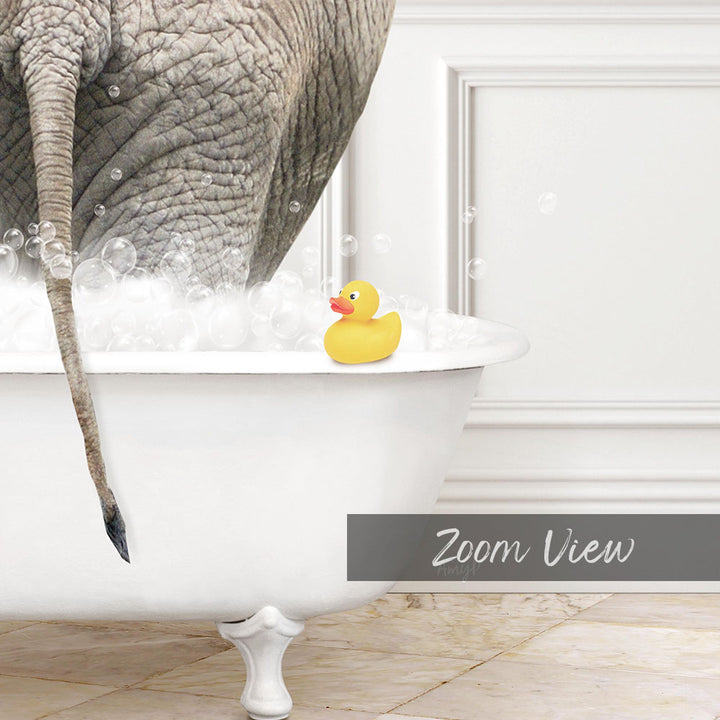 A large gray elephant is partially submerged in a white bathtub filled with bubbles, with a yellow rubber duck floating on the water's surface.