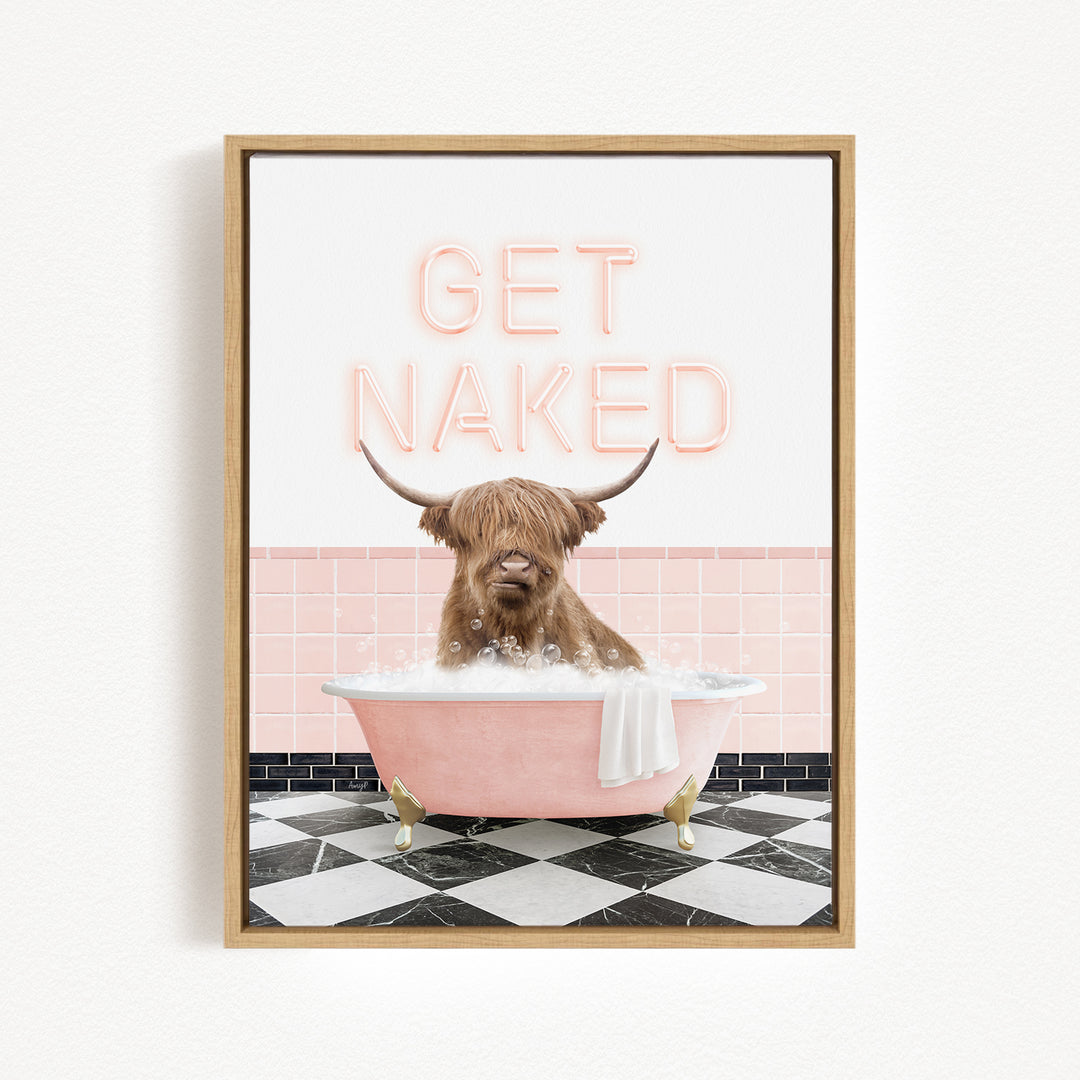 A framed image depicting a horned animal, possibly a yak or a yak dog, sitting in a pink bathtub filled with bubbles, with the text "GET NAKED" displayed above it.