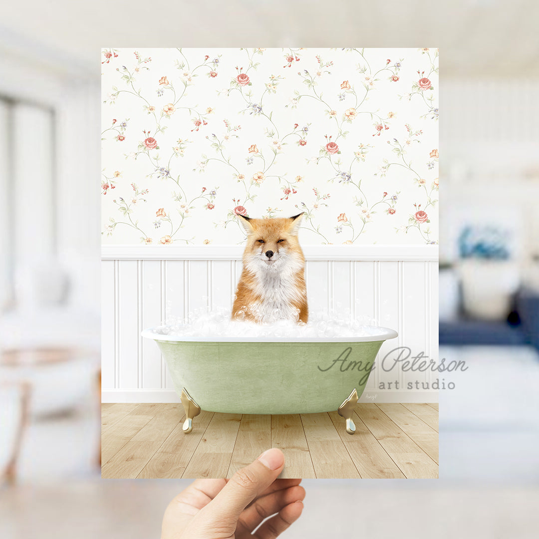 a hand holding up a photo of a dog in a bathtub