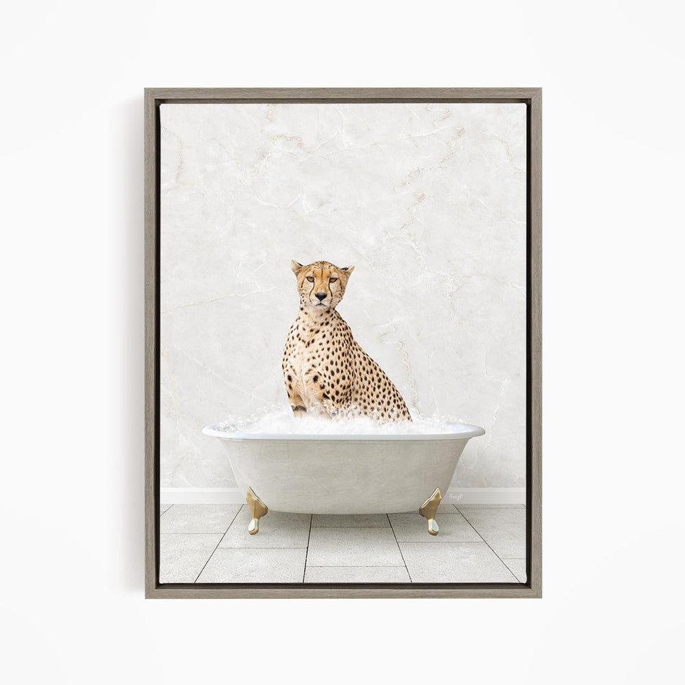 A cheetah sitting in a white bathtub filled with water, looking directly at the camera.
