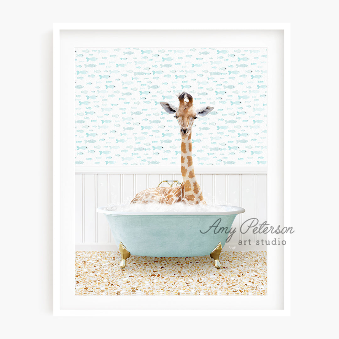 a baby giraffe is sitting in a bathtub