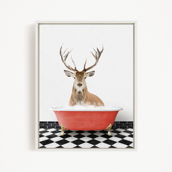 A deer with antlers is sitting in a red bathtub filled with water, surrounded by a black and white checkered floor.