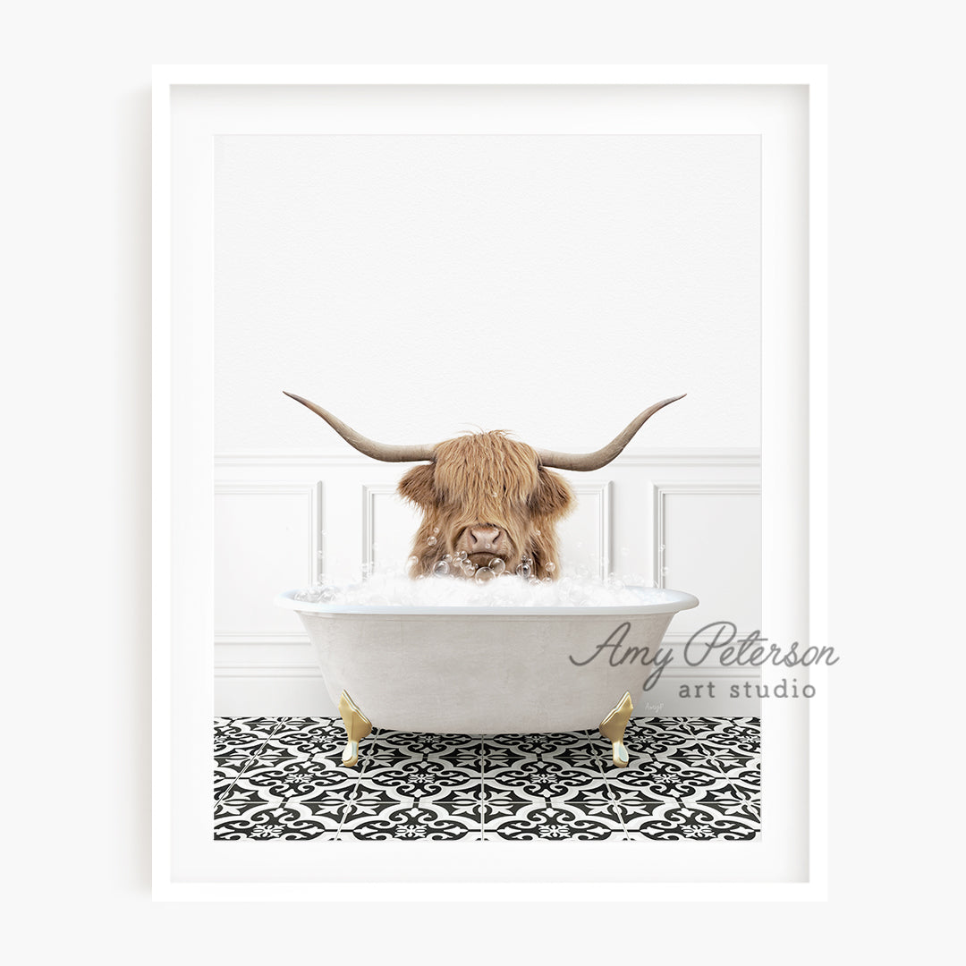 a long horn steer is taking a bath in a bathtub