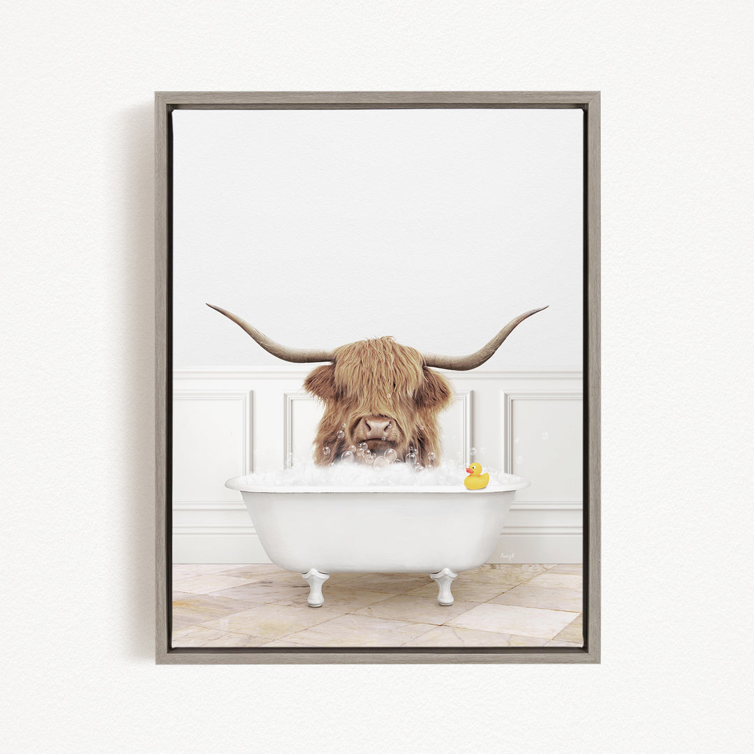 A horned animal, possibly a yak or a bison, is sitting in a white bathtub filled with water, with a rubber duck floating in the tub.