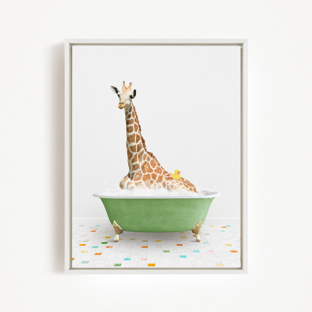A giraffe is sitting in a green bathtub filled with water, with a yellow duck resting on its back.