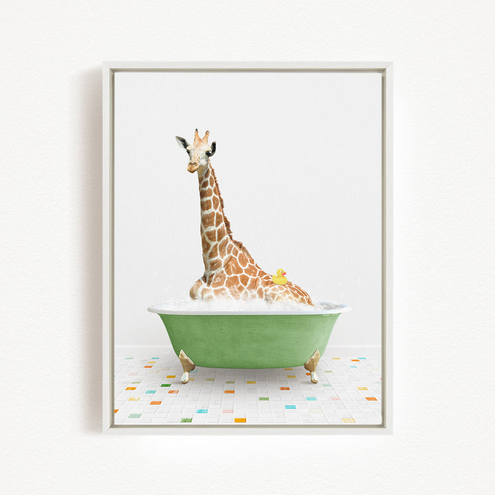 A giraffe is sitting in a green bathtub filled with water, with a yellow duck resting on its back.