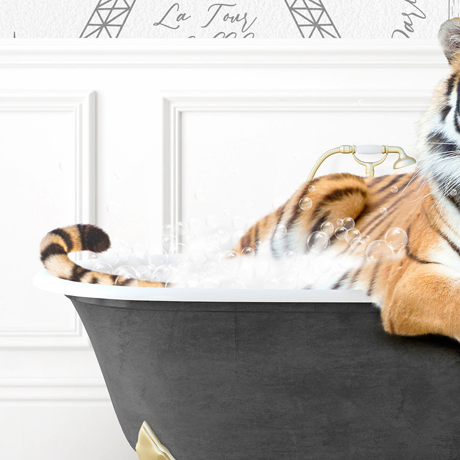 a stuffed tiger is sitting in a bathtub